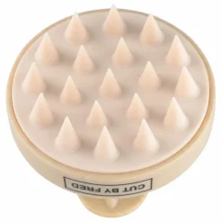 Brosse stimulante pour le cuir chevelu